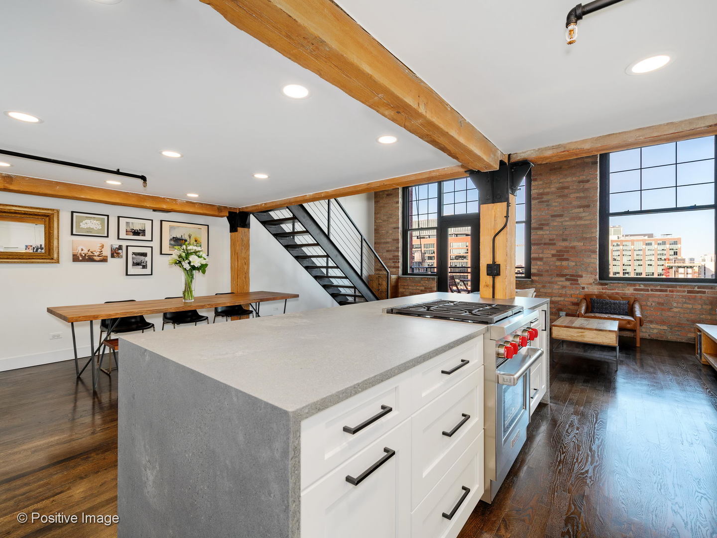 1000 West Washington Boulevard, Unit 540 Chicago, IL 60607 - Photo 7 of 28 a room with furniture and a wooden floor