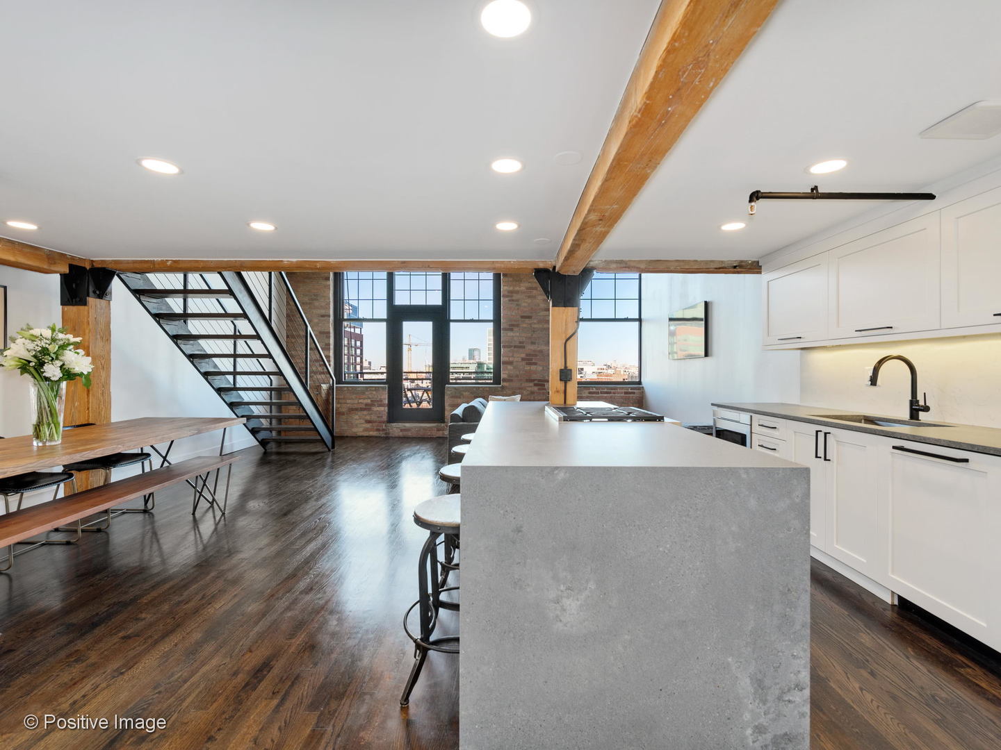 1000 West Washington Boulevard, Unit 540 Chicago, IL 60607 - Photo 8 of 28 a kitchen with sink refrigerator and cabinets
