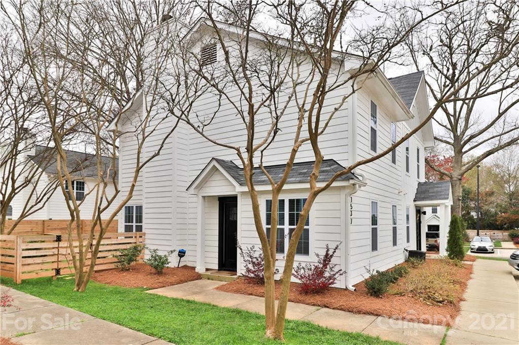 1537 Briar Creek Road, Unit A Charlotte, NC 28205 - Photo 2 of 30 front view of a house with a yard
