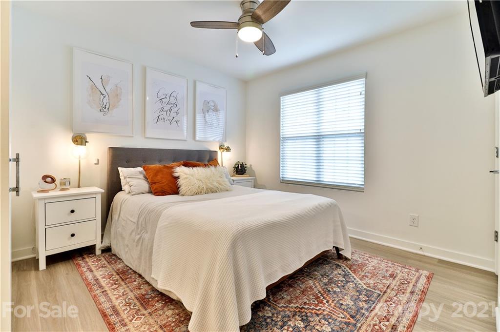 1537 Briar Creek Road, Unit A Charlotte, NC 28205 - Photo 17 of 30 a bedroom with a bed and a window