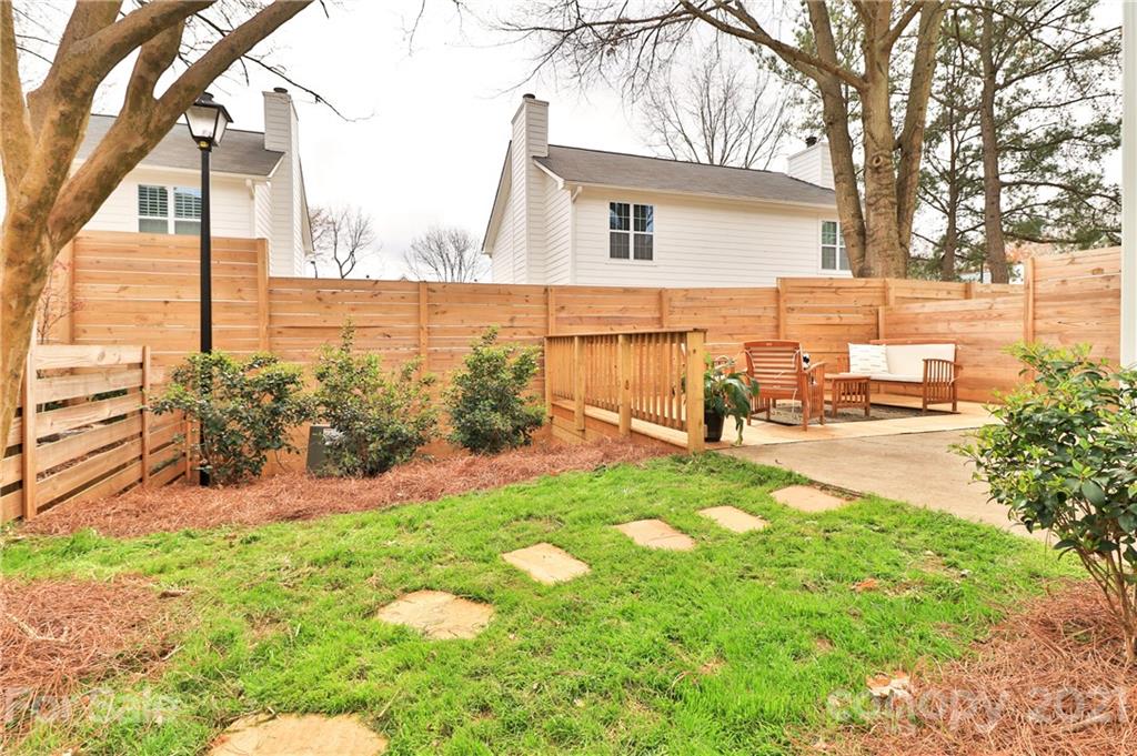 1537 Briar Creek Road, Unit A Charlotte, NC 28205 - Photo 28 of 30 a view of a backyard with sitting area