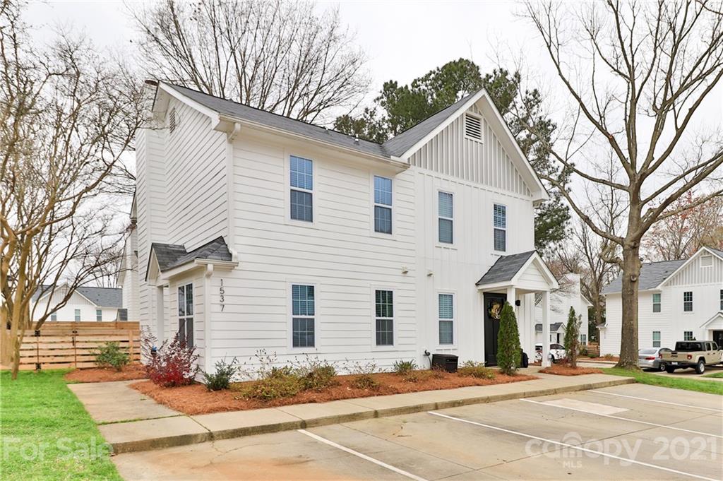 1537 Briar Creek Road, Unit A Charlotte, NC 28205 - Photo 30 of 30 a front view of a house with a yard