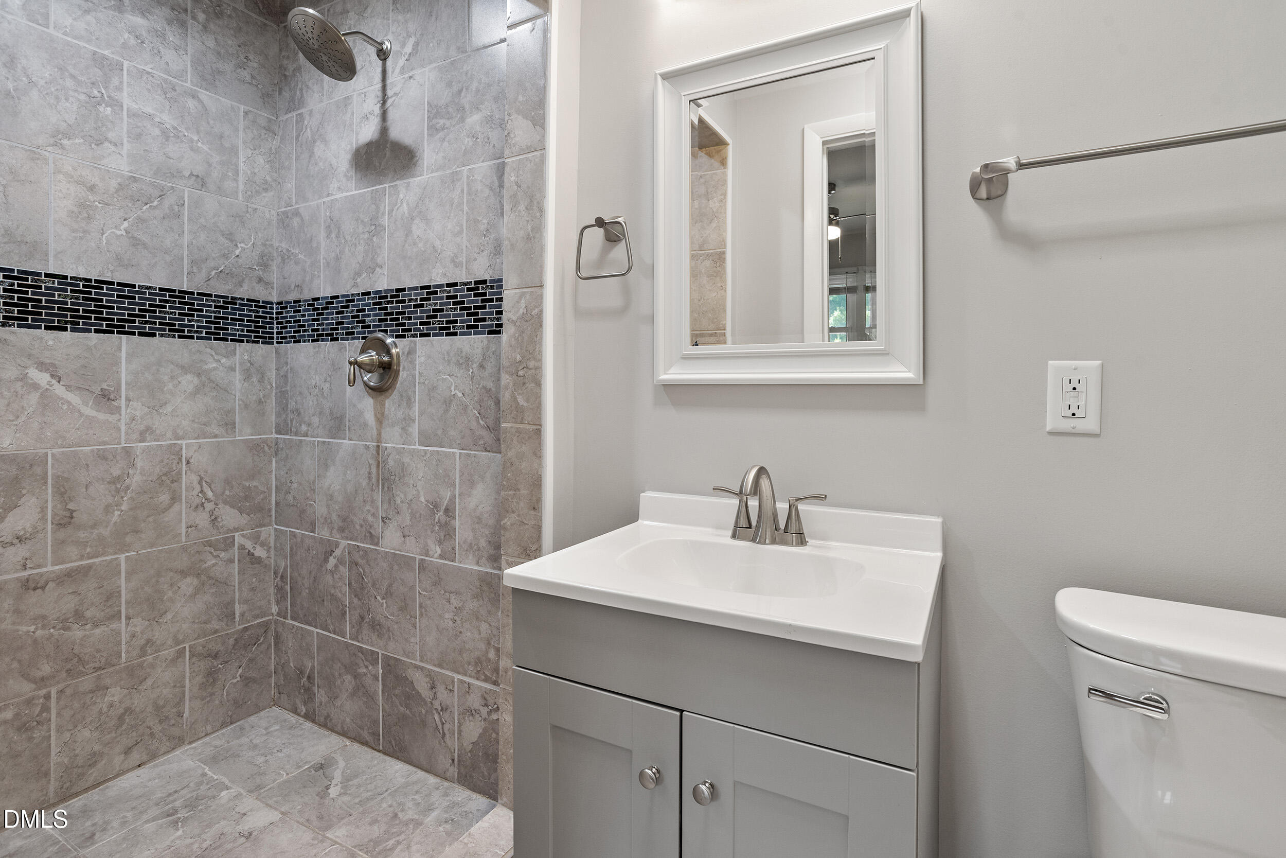 2414 Chapin Street Durham, NC 27707 - Photo 22 of 30 a bathroom with a sink toilet and vanity