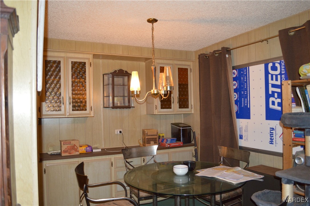 1359 Lause Road Bullhead City, AZ 86442 - Photo 5 of 17 a dining room with furniture and window