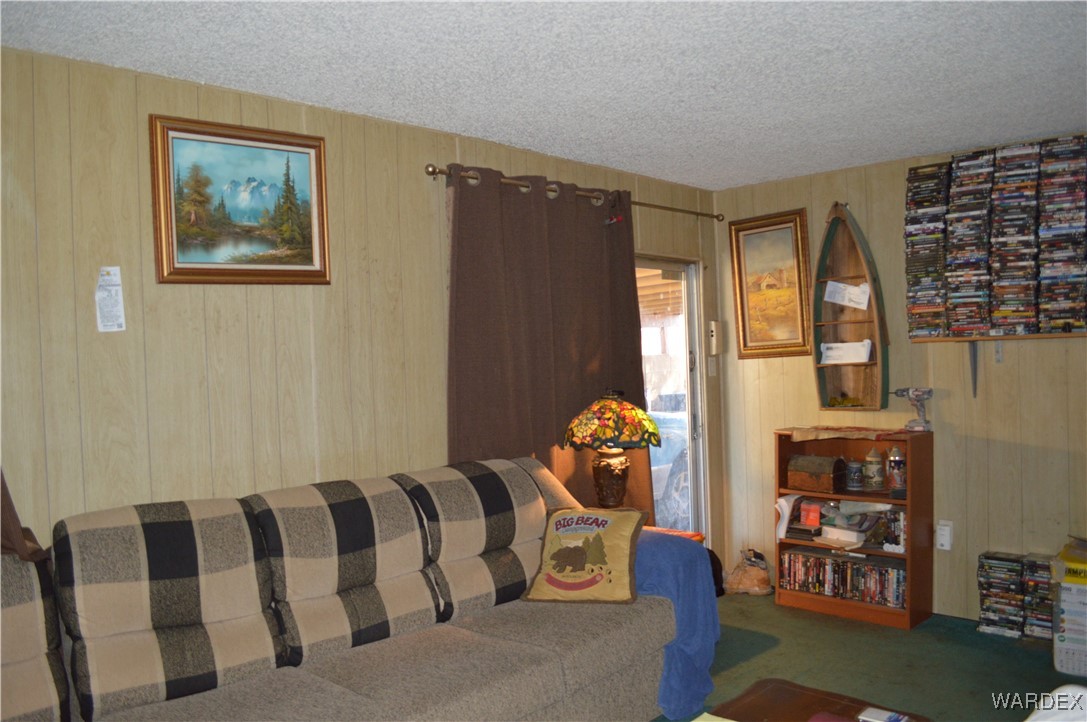 1359 Lause Road Bullhead City, AZ 86442 - Photo 6 of 17 a living room with furniture and a large window