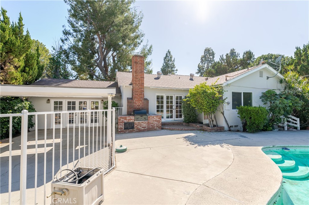 18351 San Fernando Mission Boulevard Porter Ranch, CA 91326 - Photo 23 of 29 front view of a house with a patio