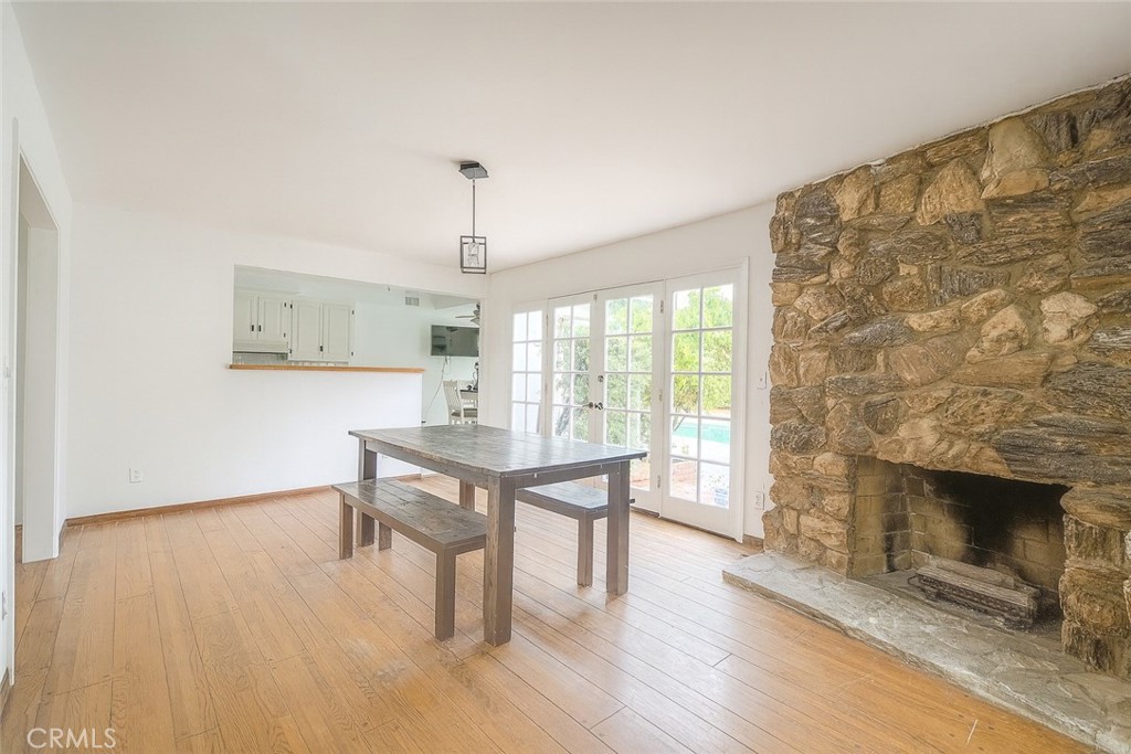 18351 San Fernando Mission Boulevard Porter Ranch, CA 91326 - Photo 6 of 29 a view of a livingroom with furniture and a fireplace