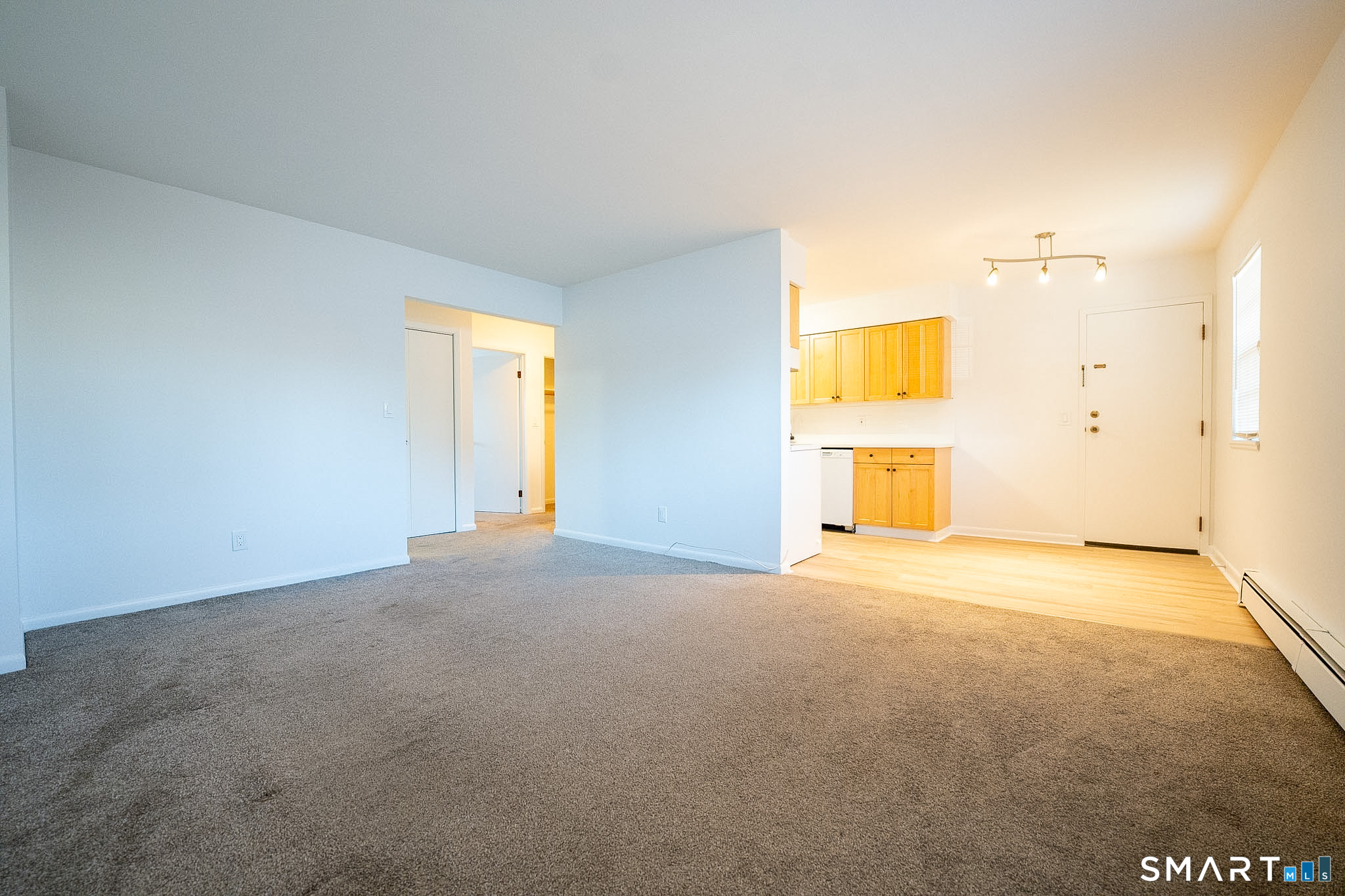 38 Enid Street, Unit B Bridgeport, CT 06606 - Photo 8 of 10 a view of an empty room with a window