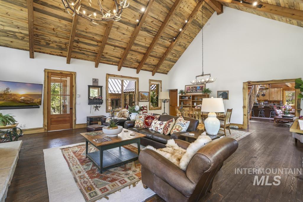65 Goat Creek Way Stanley, ID 83278 - Photo 9 of 32 Vaulted wood-plank ceiling with exposed beams