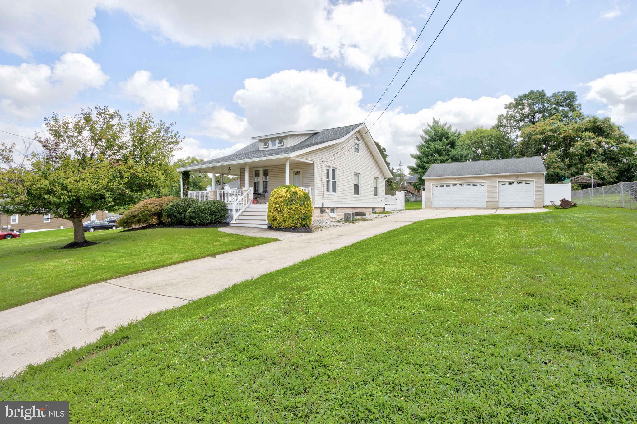 2025 Northeast Ne Baltimore, MD 21227 - Photo 1 of 122 a front view of a house with garden