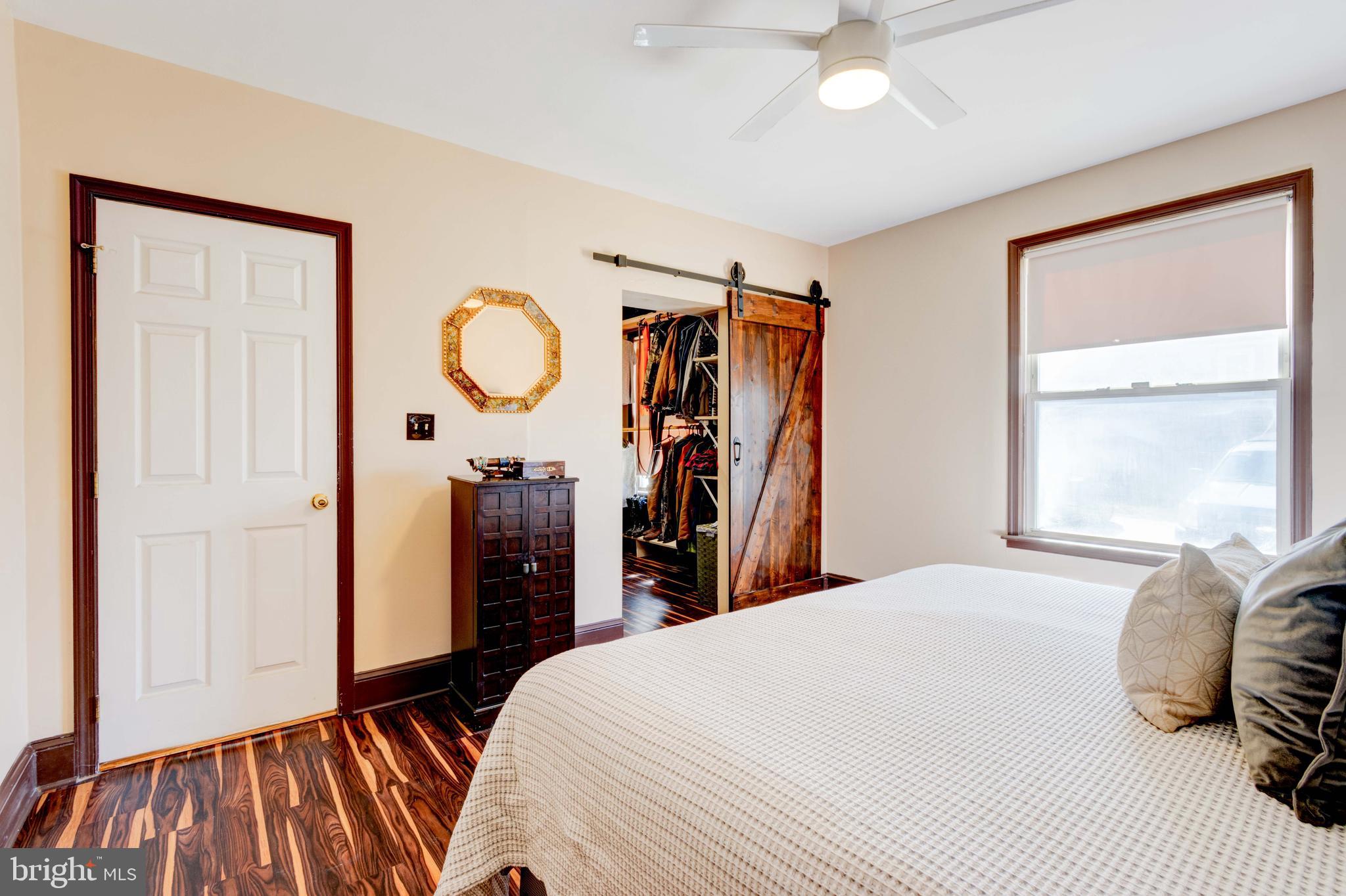 2025 Northeast Ne Baltimore, MD 21227 - Photo 25 of 122 a bed room with a bed and a mirror