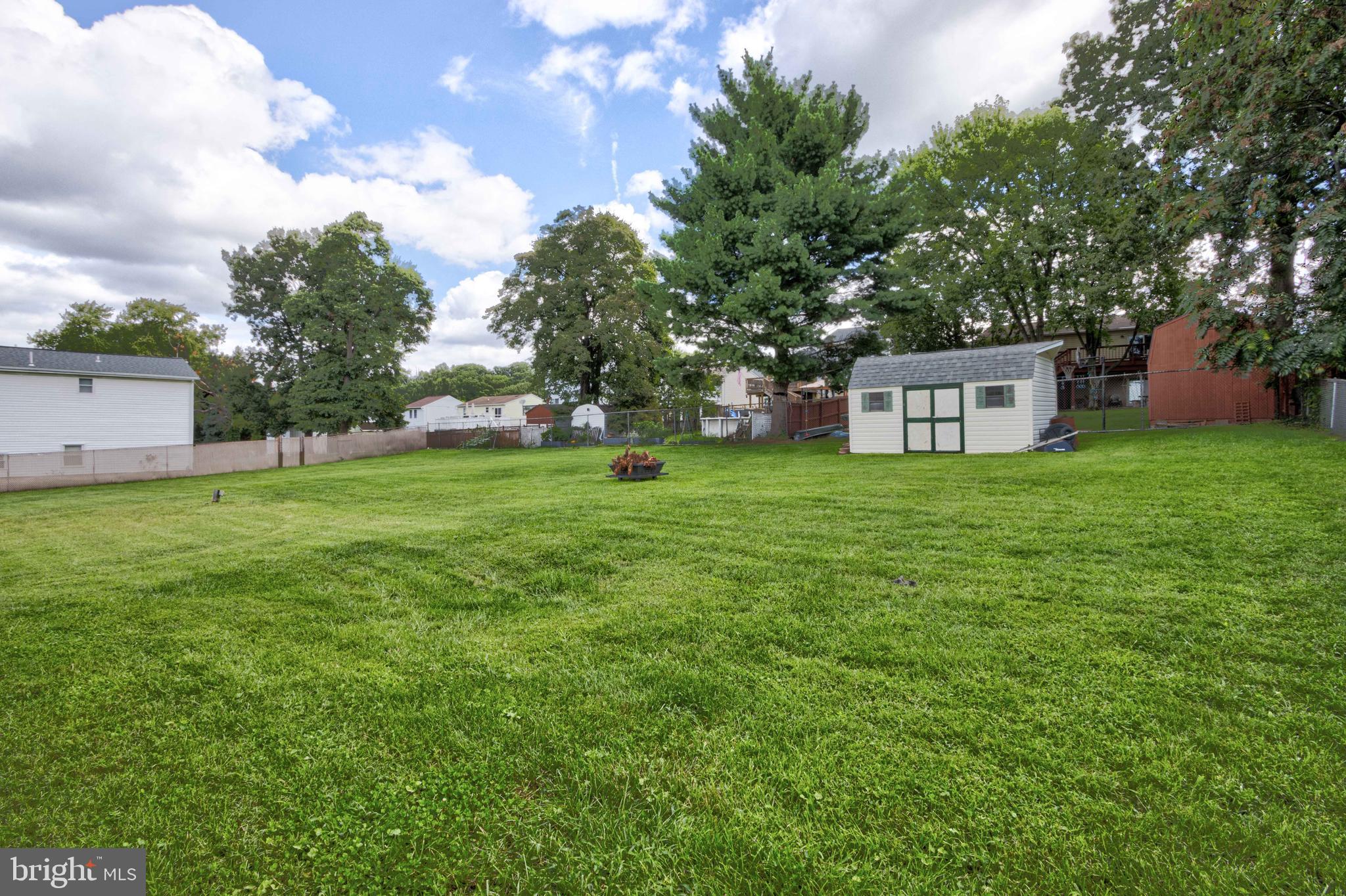 2025 Northeast Ne Baltimore, MD 21227 - Photo 53 of 122 a view of a house with a yard