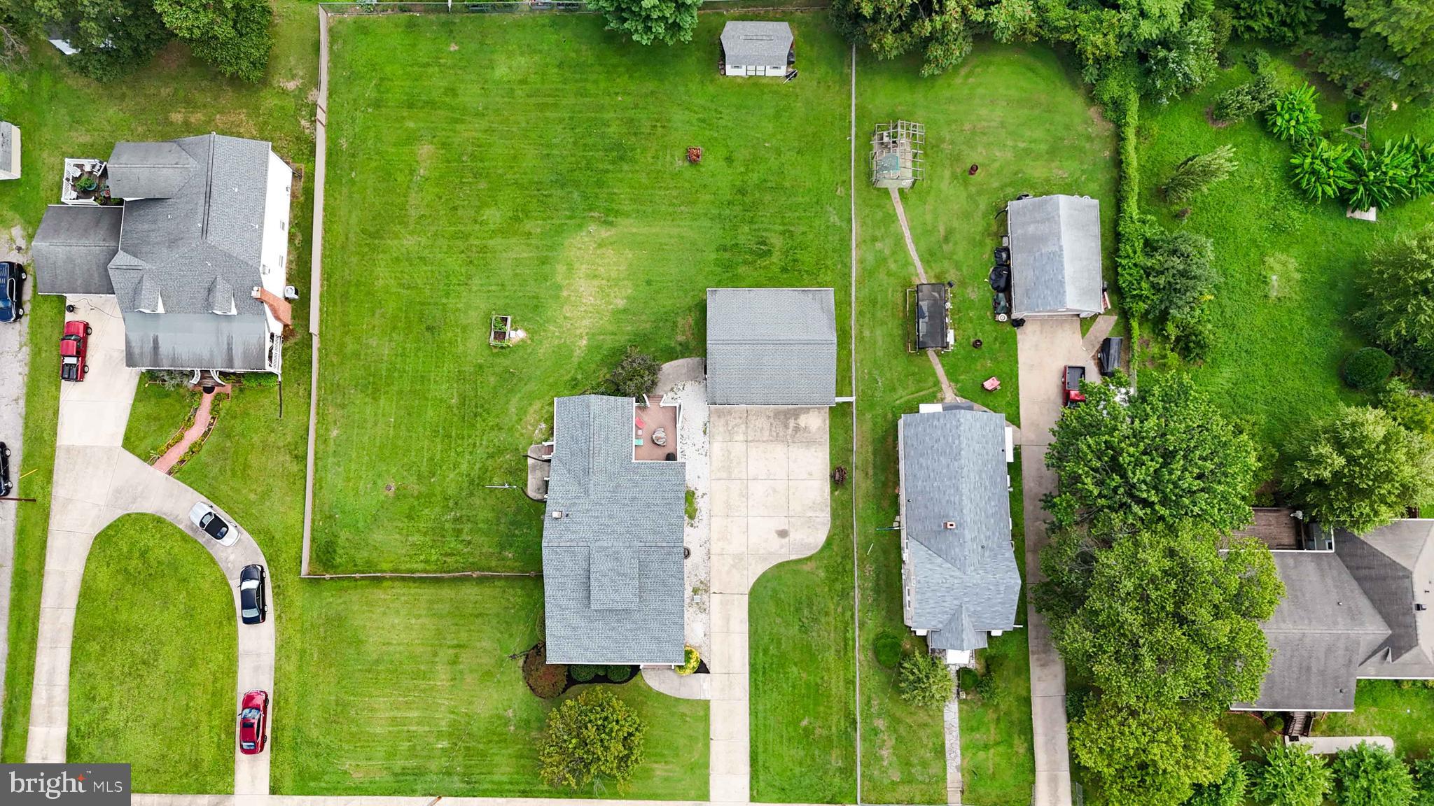 2025 Northeast Ne Baltimore, MD 21227 - Photo 57 of 122 an aerial view of a house with a swimming pool