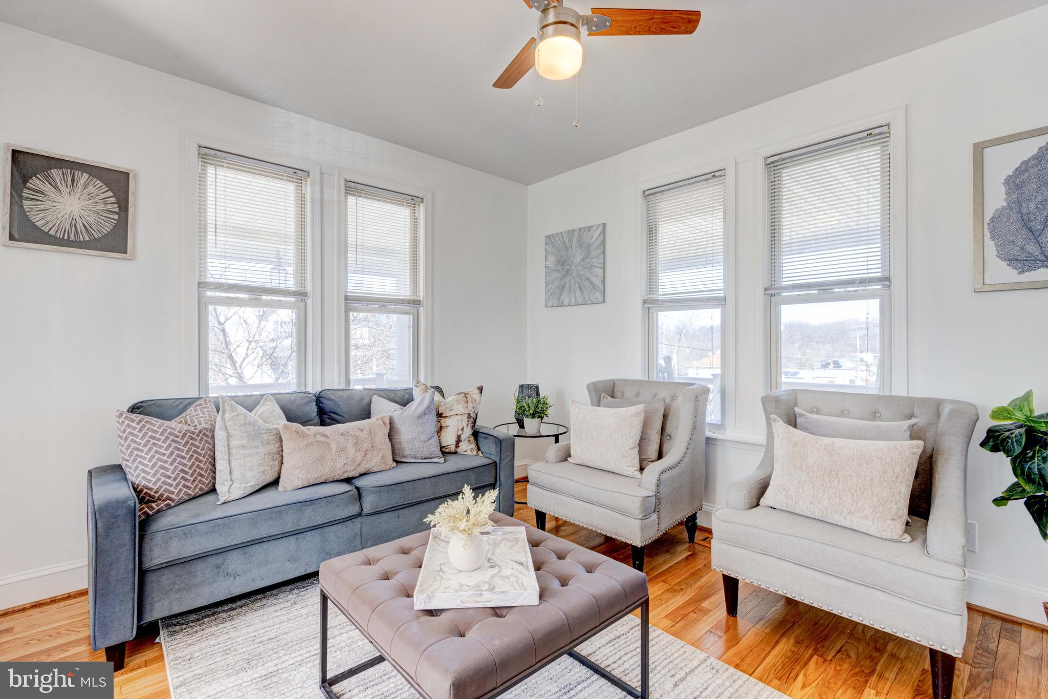 2025 Northeast Ne Baltimore, MD 21227 - Photo 7 of 122 a living room with furniture and a large window