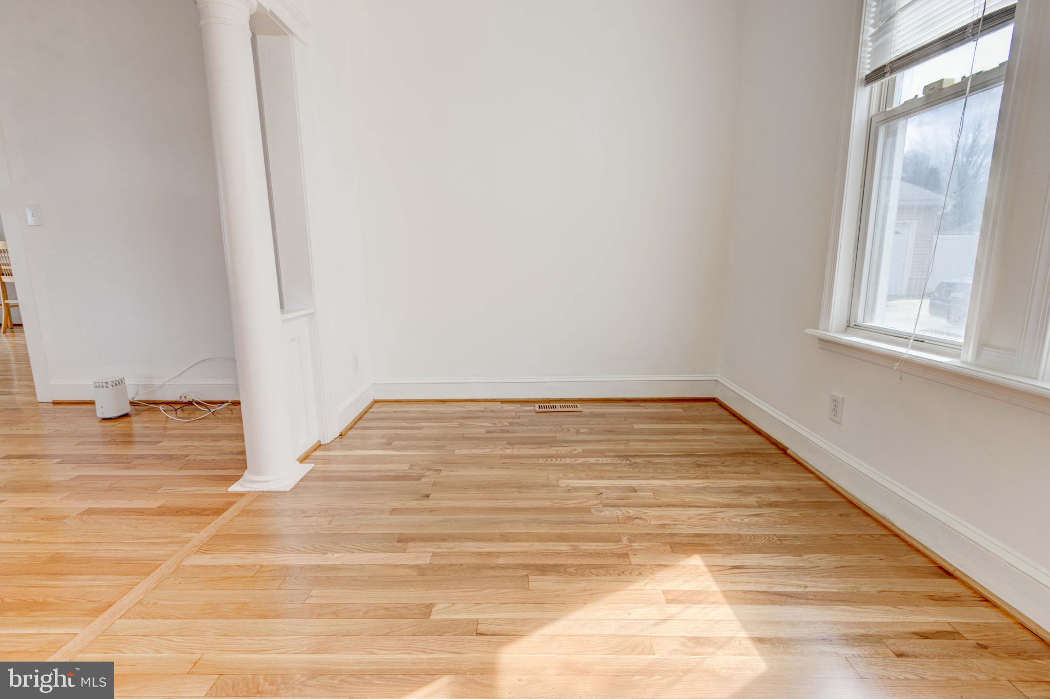 2025 Northeast Ne Baltimore, MD 21227 - Photo 91 of 122 a view of a room with wooden floor and window