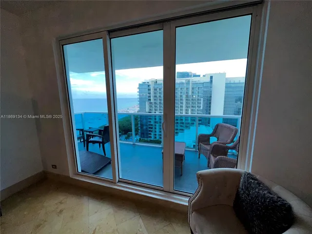 a room with furniture and a window