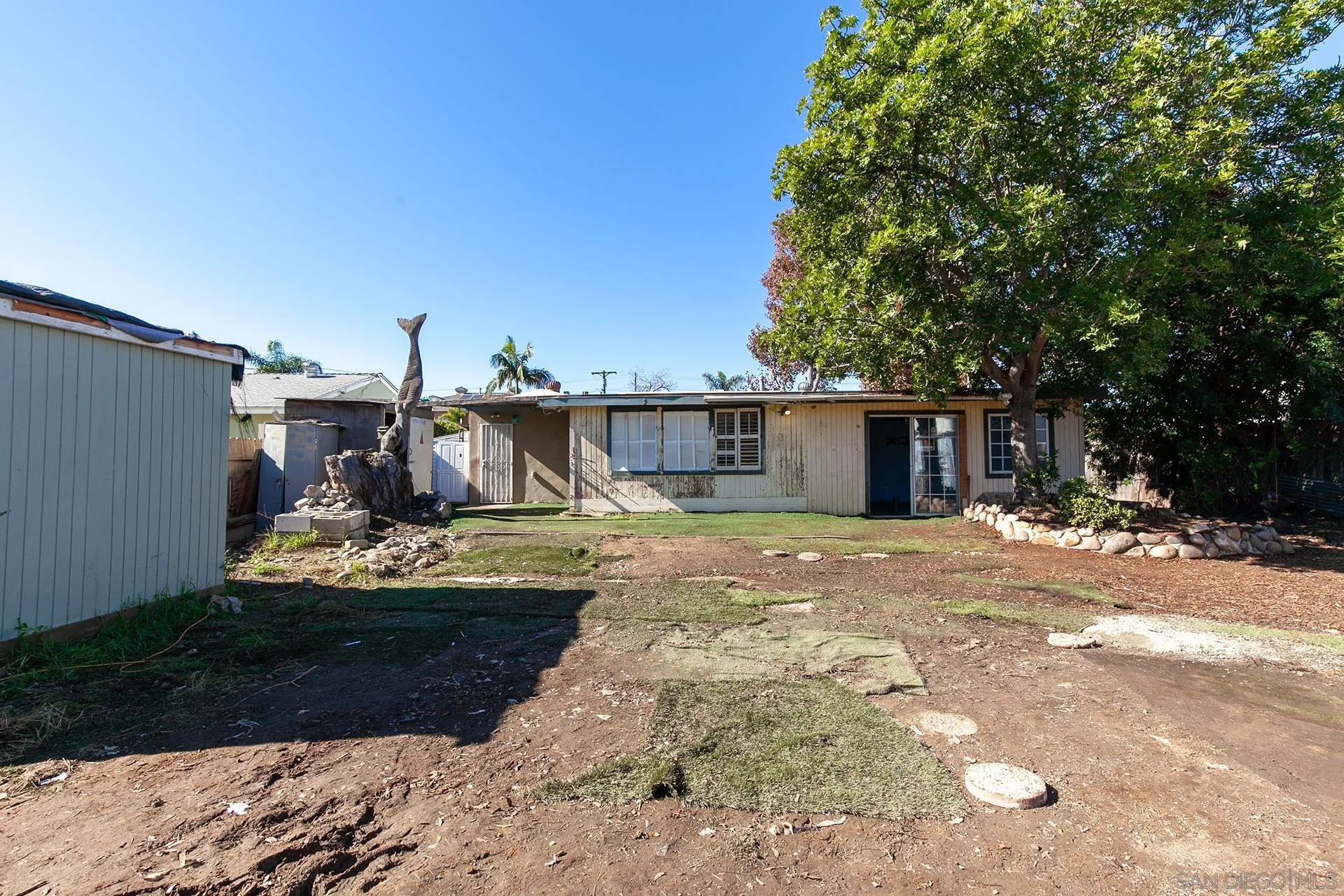 4539 Gila Avenue San Diego, CA 92117 - Photo 20 of 27 a view of a house with backyard and sitting area