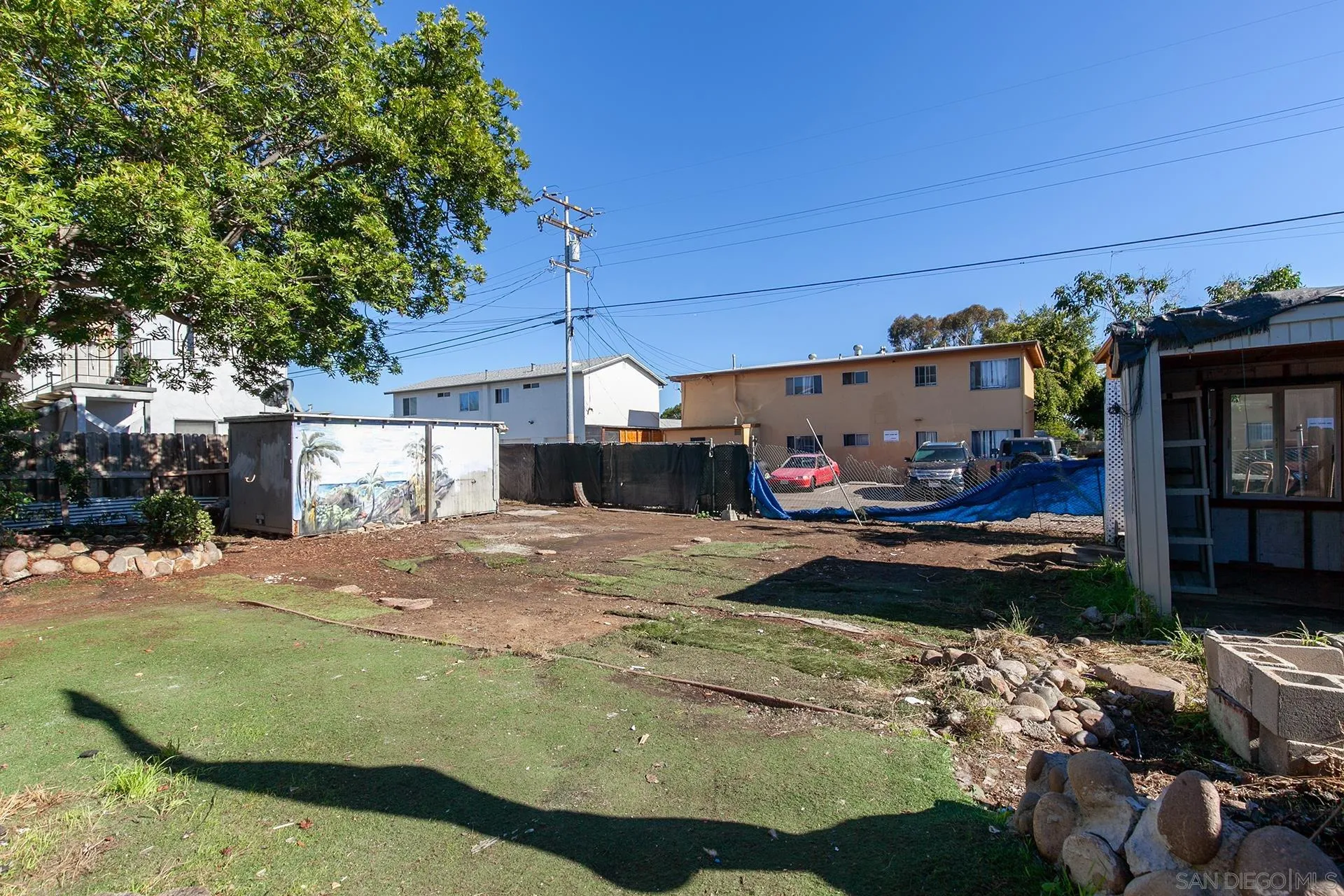 4539 Gila Avenue San Diego, CA 92117 - Photo 23 of 27 a front view of a house with a yard