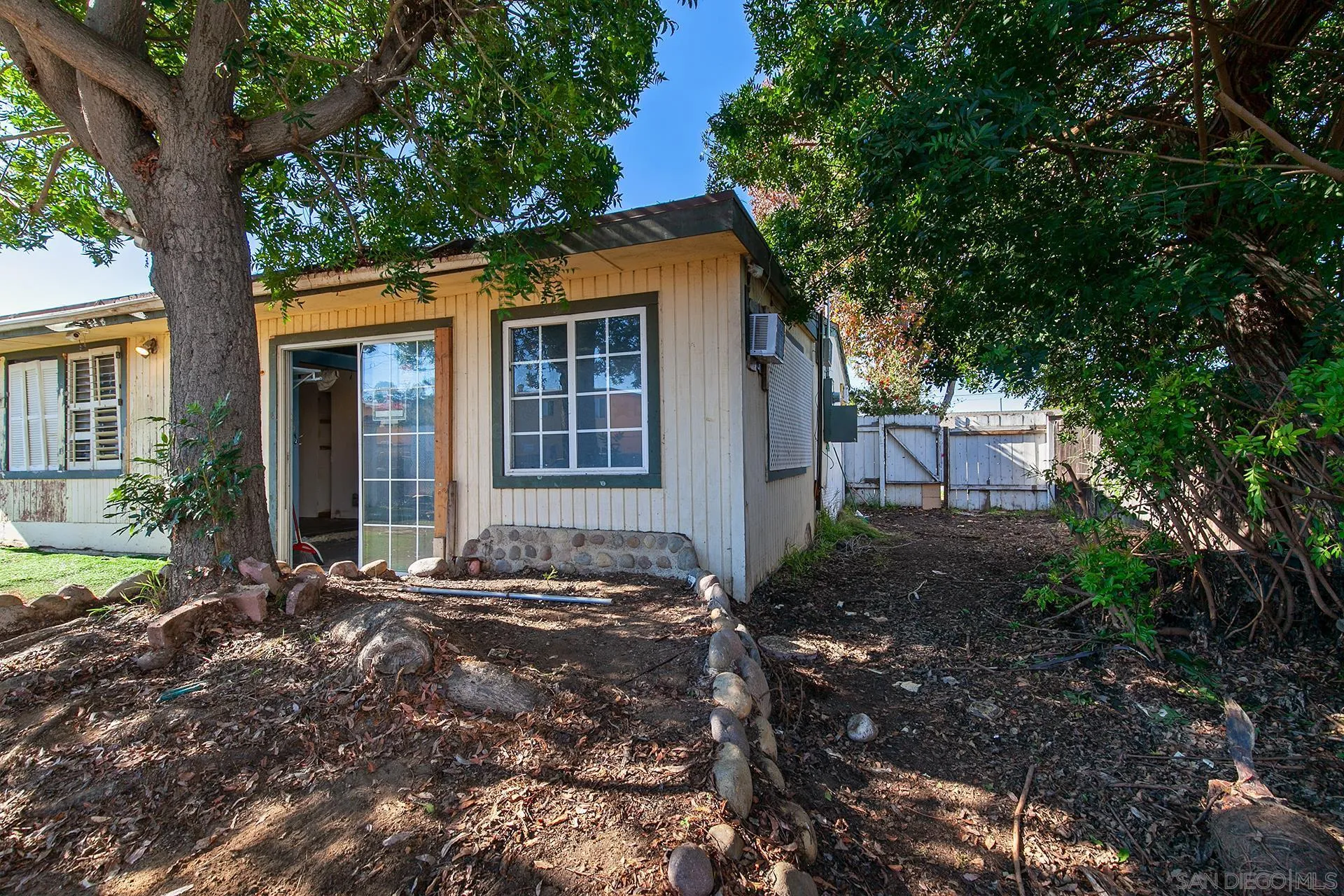 4539 Gila Avenue San Diego, CA 92117 - Photo 24 of 27 a front view of a house with garden