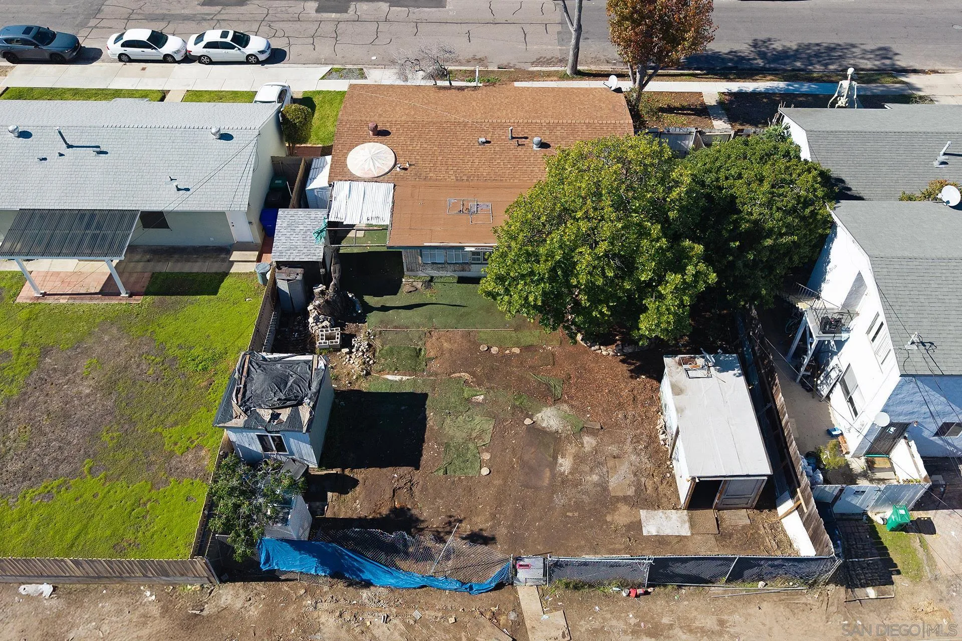 4539 Gila Avenue San Diego, CA 92117 - Photo 3 of 27 a front view of a house with a yard
