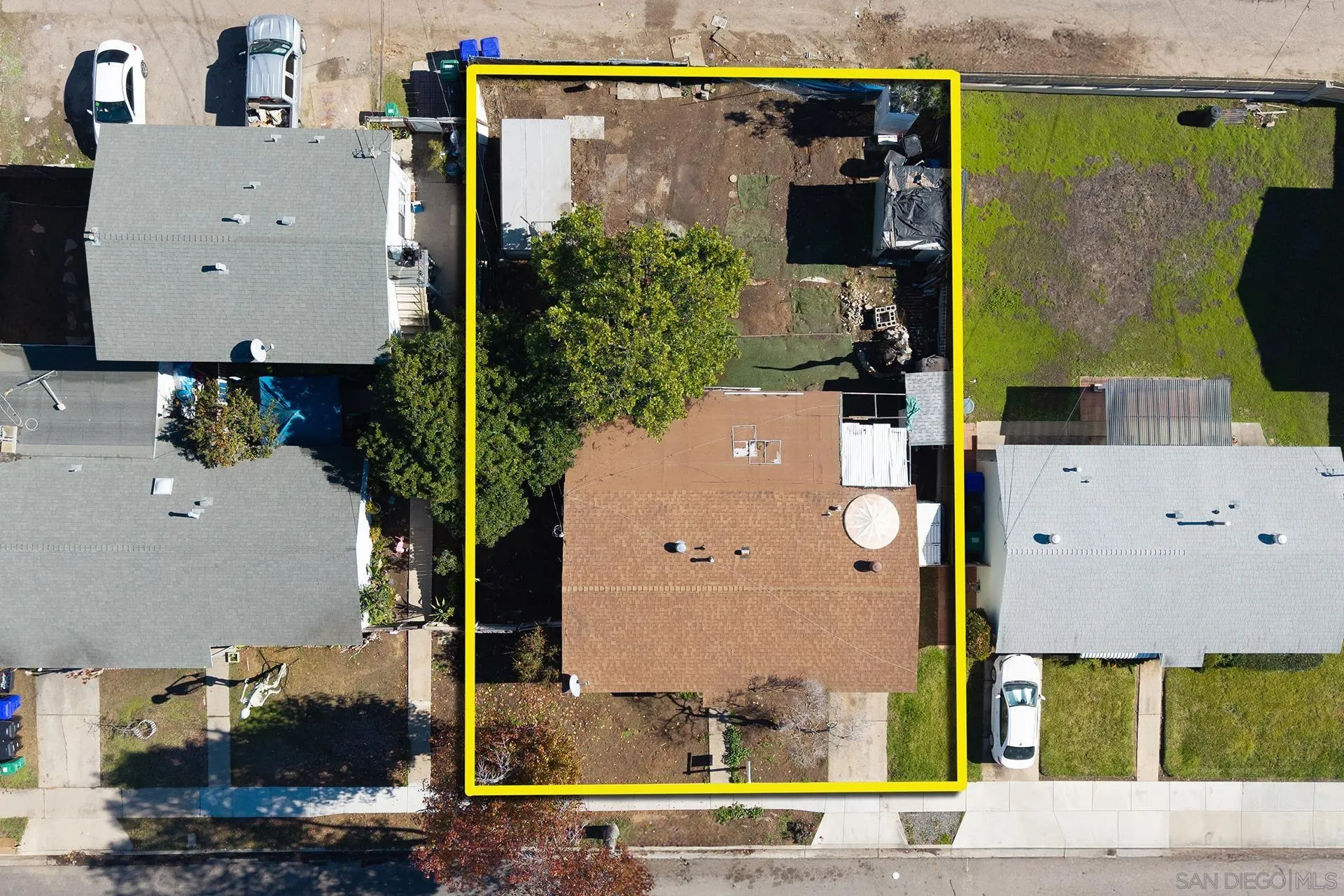 4539 Gila Avenue San Diego, CA 92117 - Photo 4 of 27 an aerial view of a house with a yard and large tree