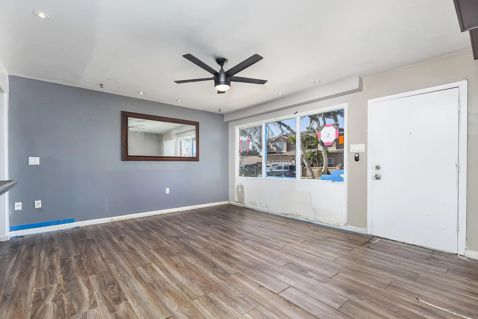 4539 Gila Avenue San Diego, CA 92117 - Photo 5 of 27 a view of empty room with wooden floor and fan