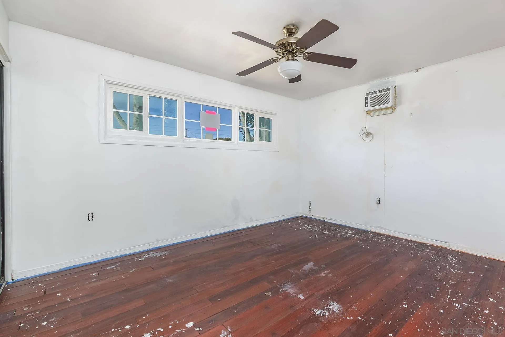4539 Gila Avenue San Diego, CA 92117 - Photo 10 of 27 a view of empty room with wooden floor