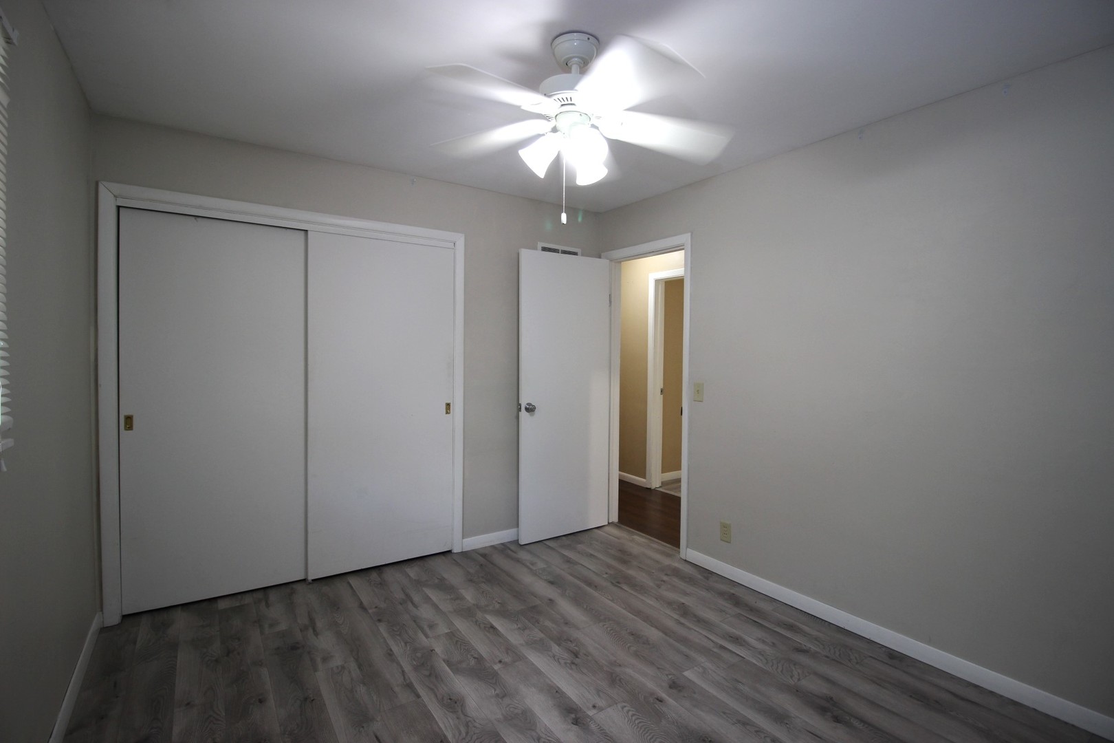 800 Bryan Street Normal, IL 61761 - Photo 17 of 27 a view of an empty room with a window
