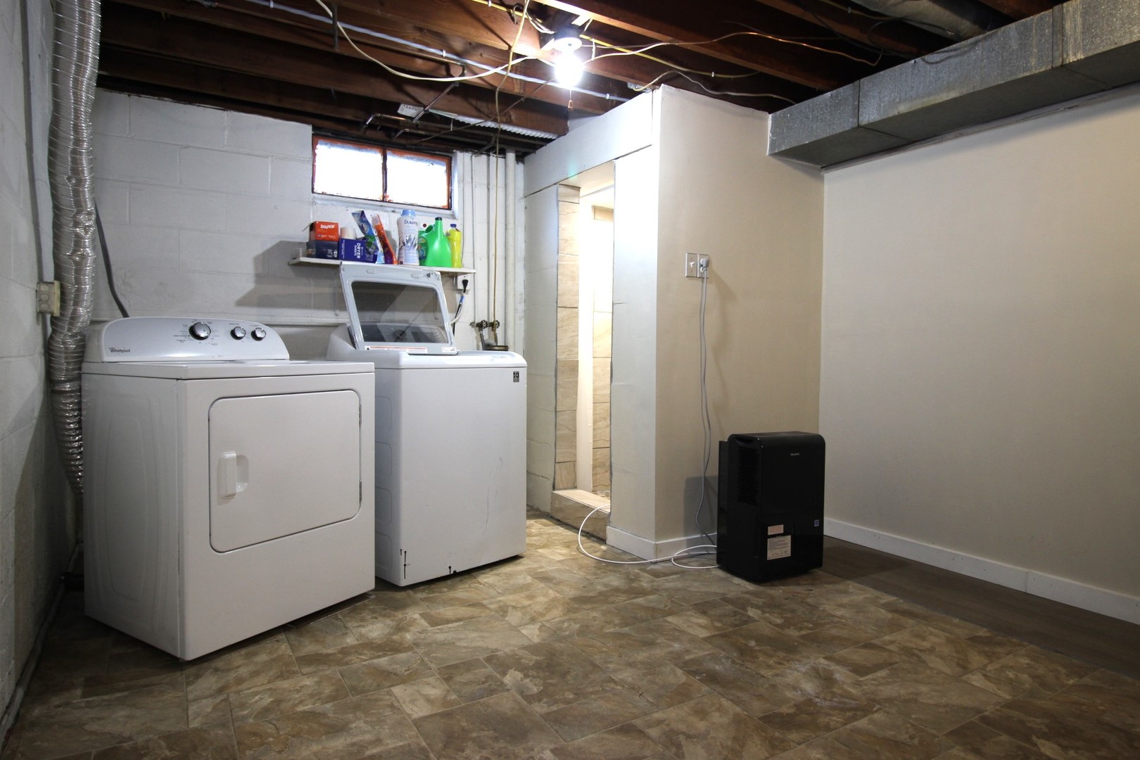 800 Bryan Street Normal, IL 61761 - Photo 20 of 27 a view of storage and utility room with washer and dryer