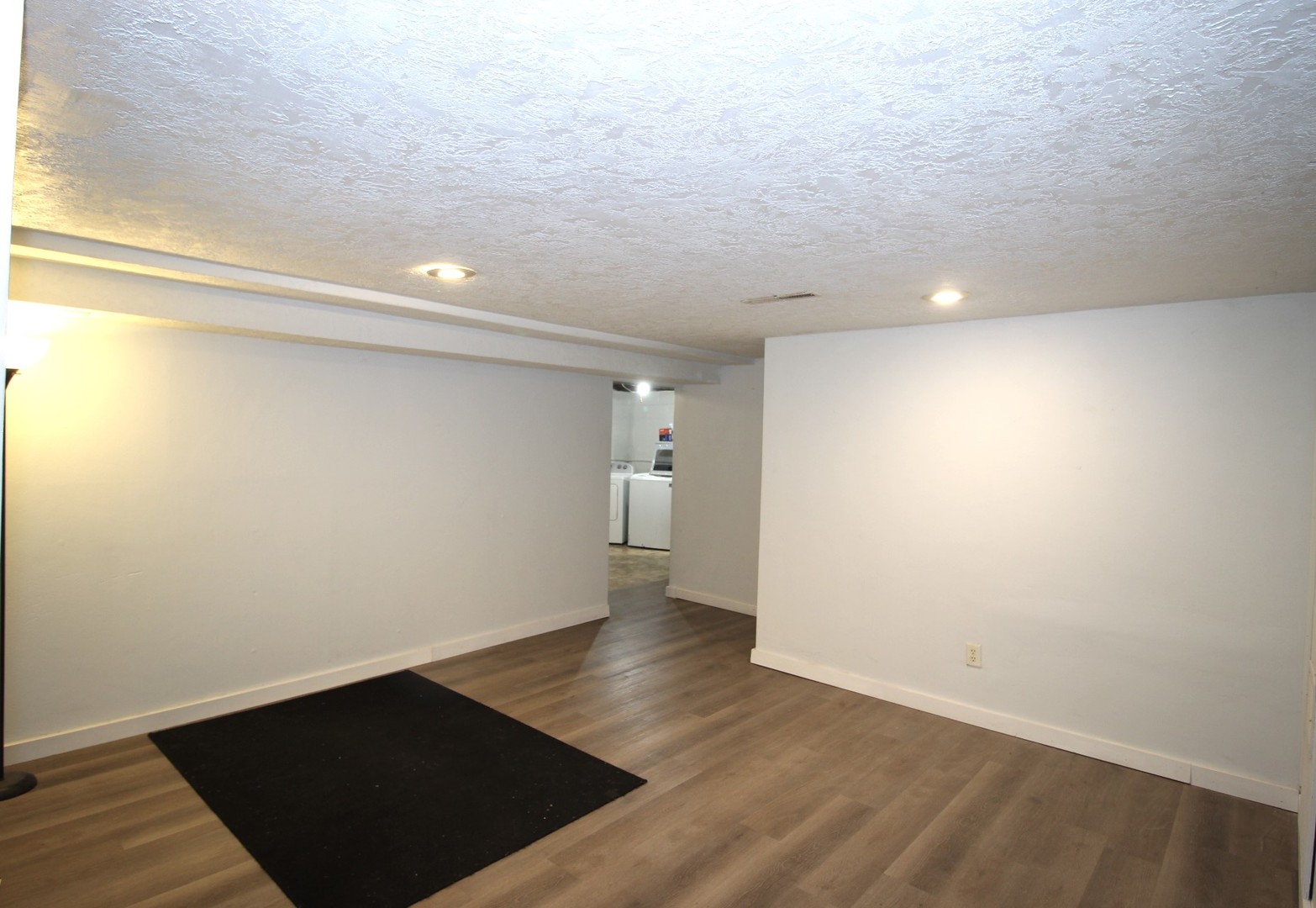 800 Bryan Street Normal, IL 61761 - Photo 24 of 27 a view of an empty room with wooden floor