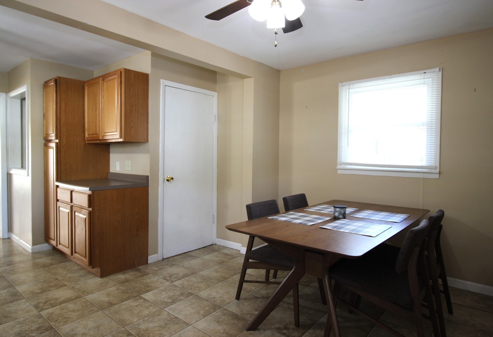 800 Bryan Street Normal, IL 61761 - Photo 8 of 27 a view of a dining room with furniture and window