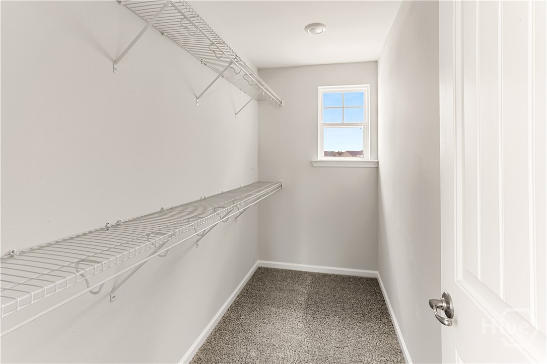 116 Peabody Street Savannah, GA 31407 - Photo 16 of 40 Walk in Closet (1 of 2) in Primary Bedroom