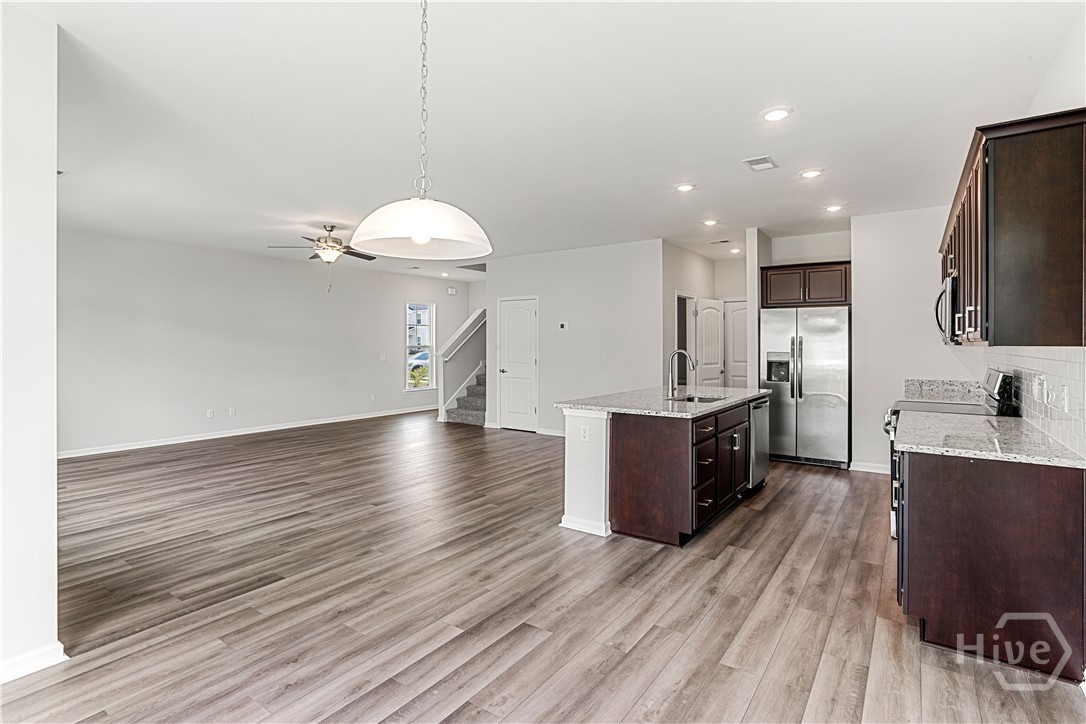 116 Peabody Street Savannah, GA 31407 - Photo 6 of 40 Great Room and Kitchen different angle