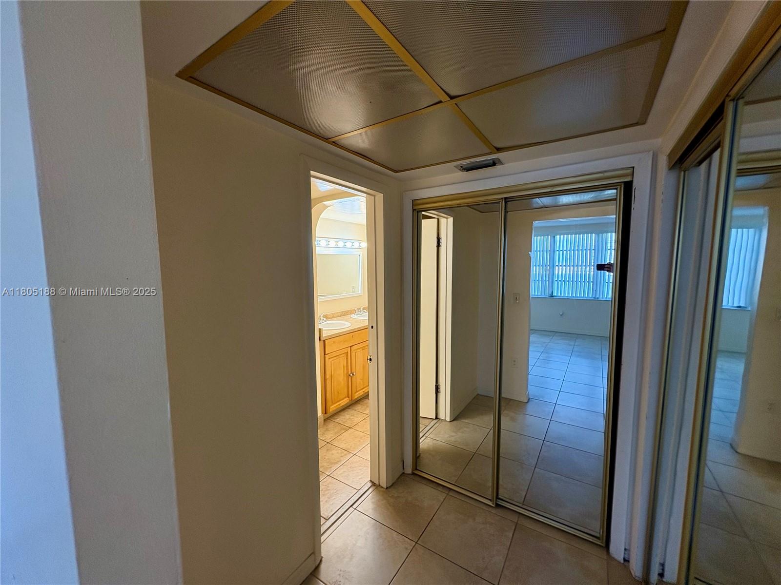 Fifth Moorings Condominium Miami, FL 33179 - Photo 17 of 29 a view of a hallway