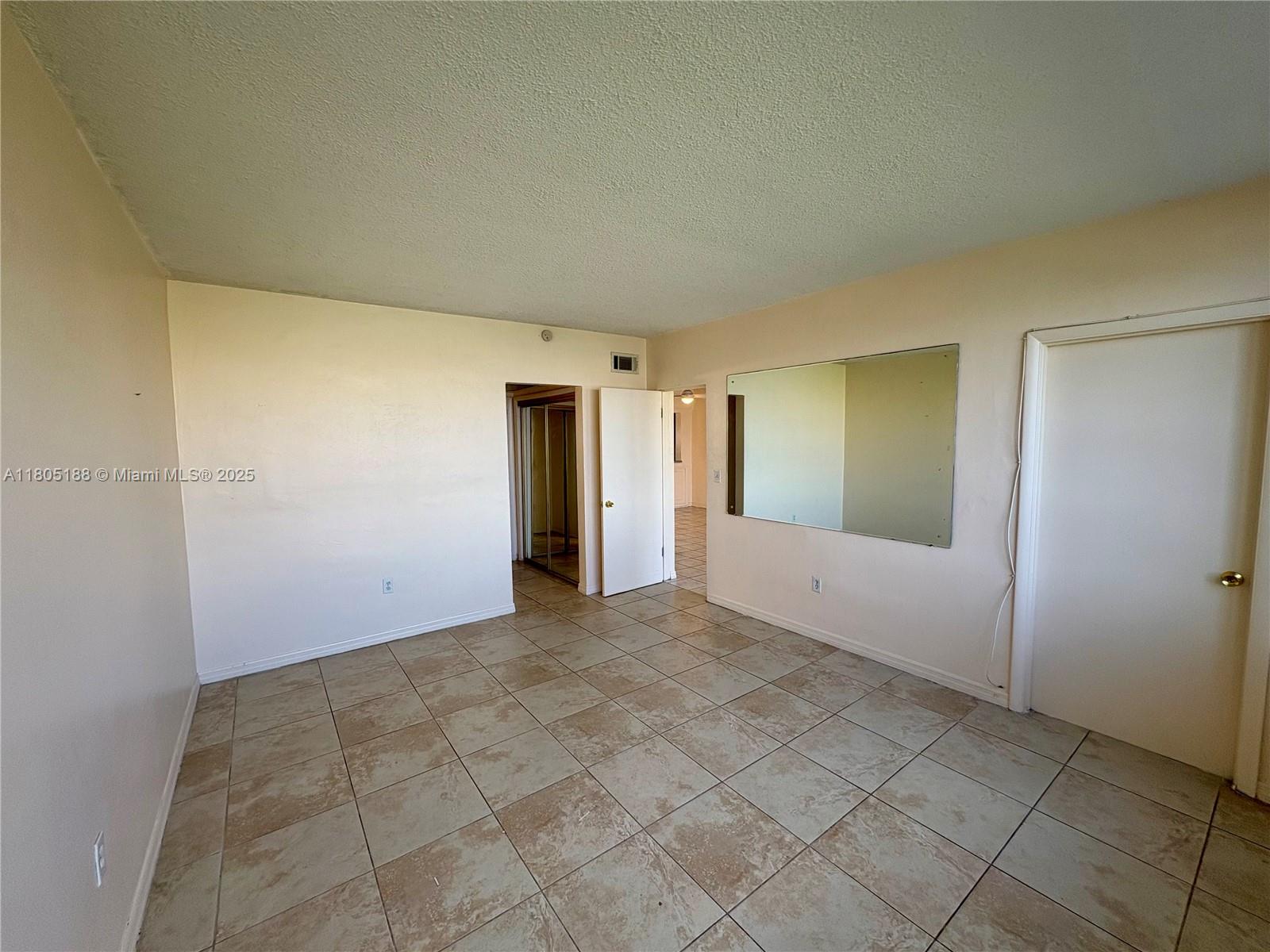 Fifth Moorings Condominium Miami, FL 33179 - Photo 19 of 29 a view of an empty room and window