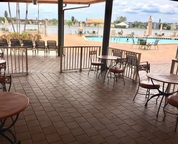 Fifth Moorings Condominium Miami, FL 33179 - Photo 27 of 29 an outdoor view with a chairs