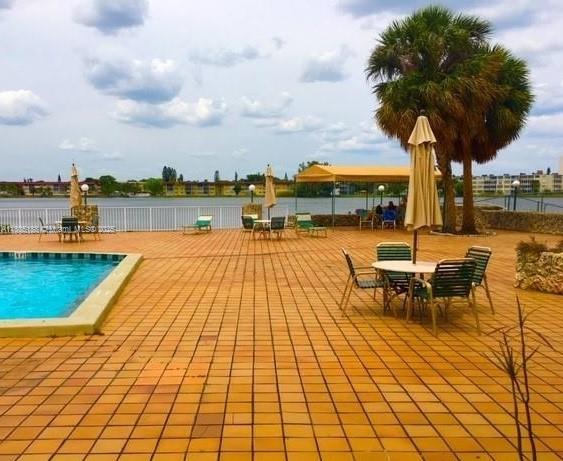 Fifth Moorings Condominium Miami, FL 33179 - Photo 28 of 29 an outdoor space with patio