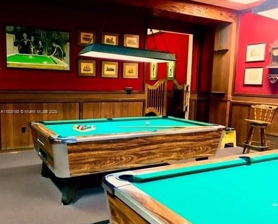 Fifth Moorings Condominium Miami, FL 33179 - Photo 6 of 29 a small pool is sitting in front of a building