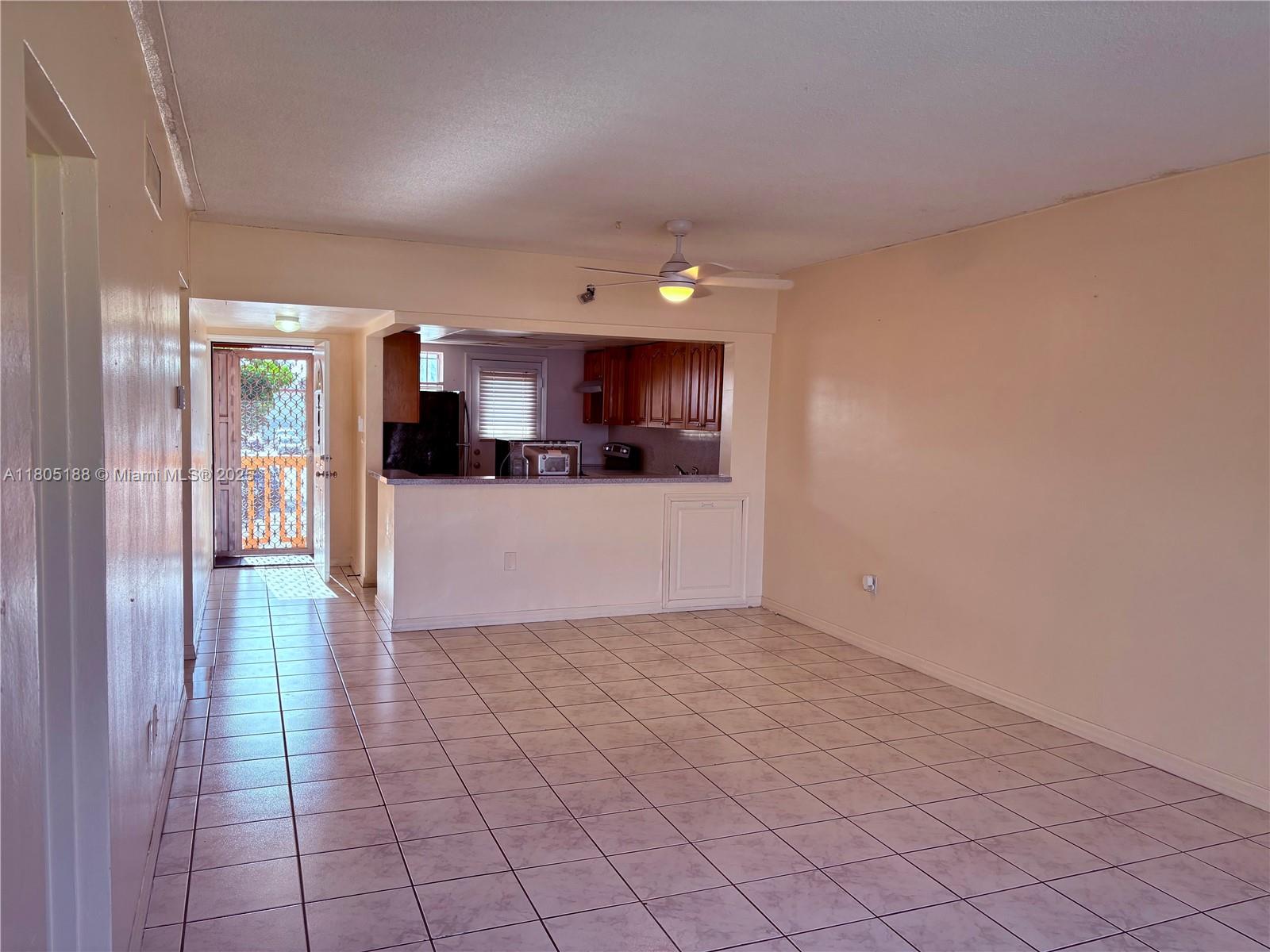 Fifth Moorings Condominium Miami, FL 33179 - Photo 8 of 29 a view of a kitchen with a sink and cabinets