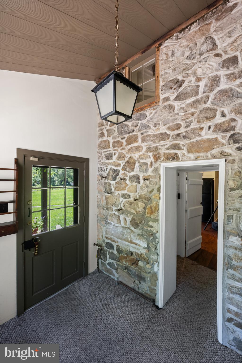 295 Marshall Bridge Road Kennett Square, PA 19348 - Photo 5 of 45 Exposed Stone Wall in Mudroom