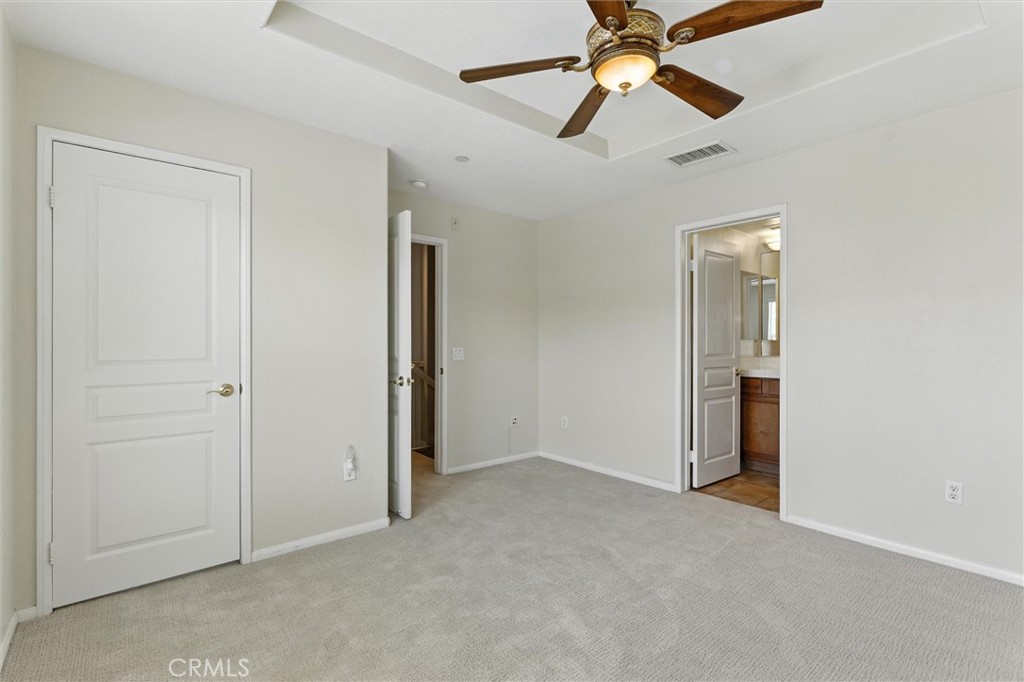 57 Hinterland Way Ladera Ranch, CA 92694 - Photo 16 of 41 an empty room and chandelier fan