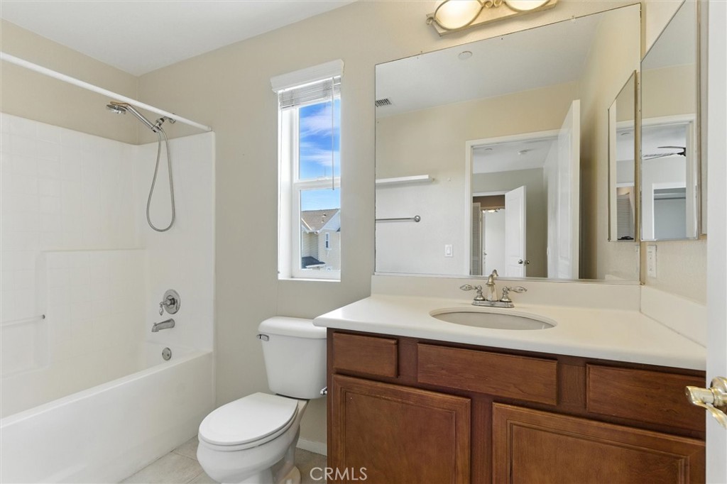 57 Hinterland Way Ladera Ranch, CA 92694 - Photo 20 of 41 a bathroom with a sink a toilet and shower