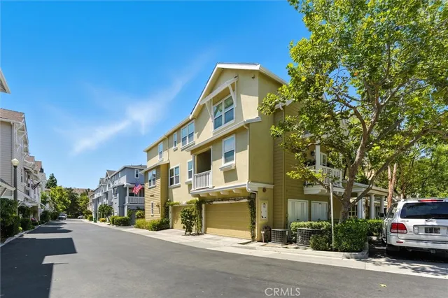 a view of a street with a building in the background