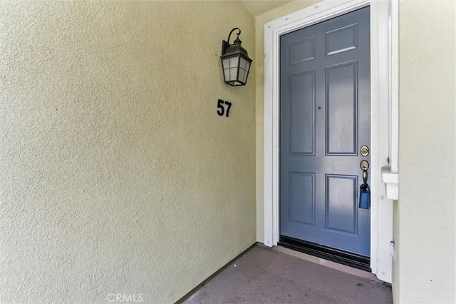 a bathroom with a granite countertop mirror and a sink