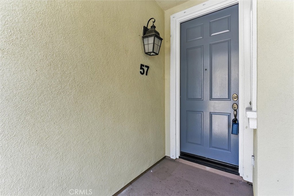 57 Hinterland Way Ladera Ranch, CA 92694 - Photo 3 of 41 a bathroom with a granite countertop mirror and a sink