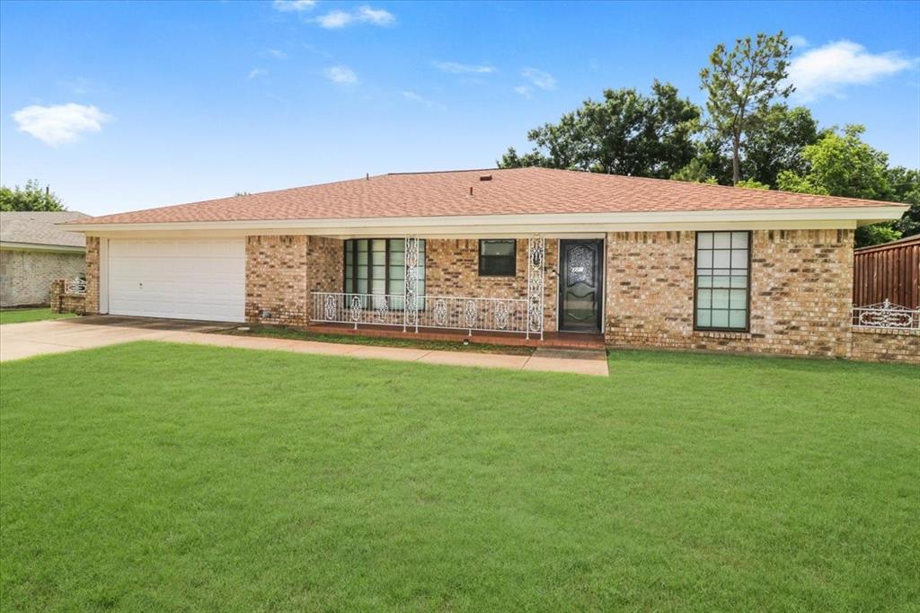 a view of a house with a garden