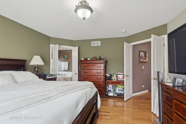 a bedroom with a bed and furniture