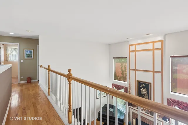 a view of a hallway with windows
