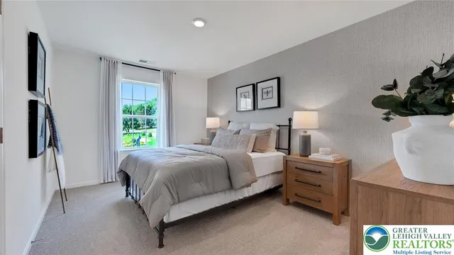 a view of livingroom with furniture and workspace