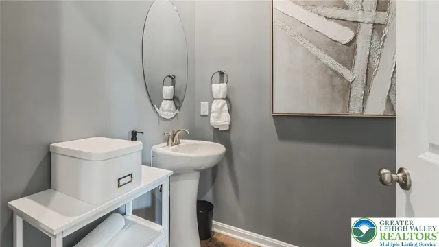 a kitchen with stainless steel appliances granite countertop a refrigerator a stove top oven a sink and dishwasher